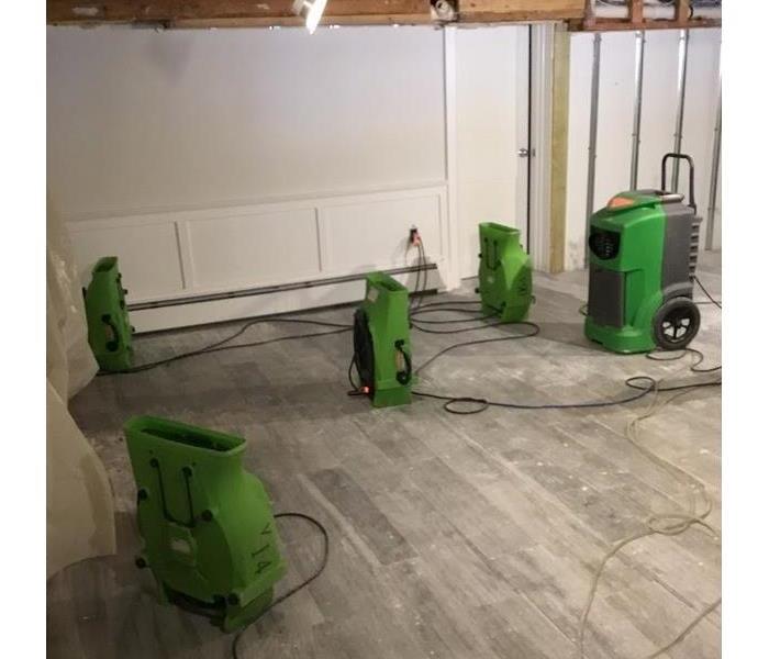 SERVPRO equipment in the room of a home